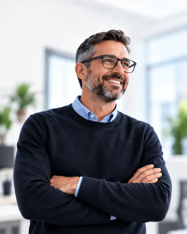 Business owner reviewing operations with confidence